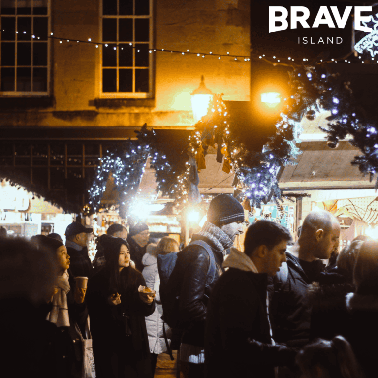 People at a Christmas market at night time