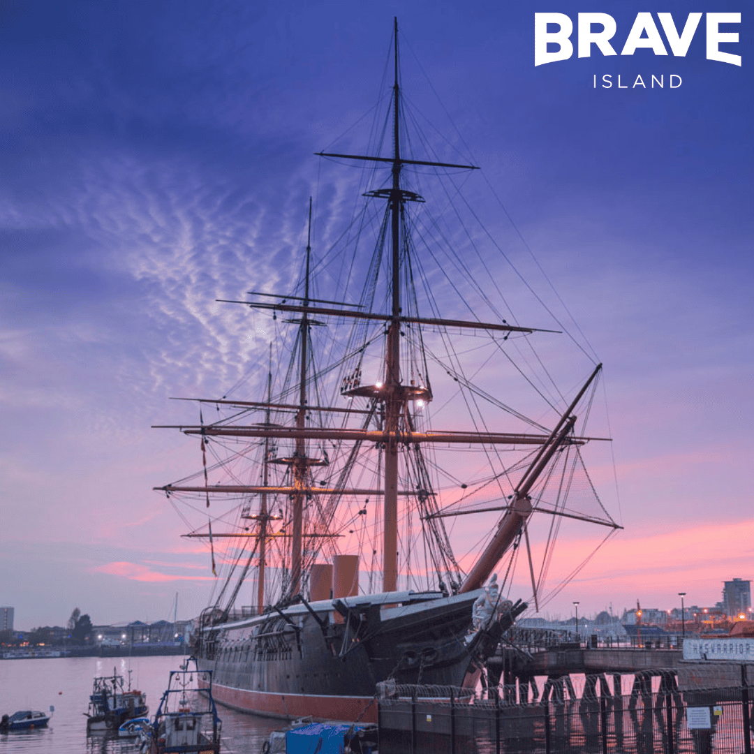 photo of the warrior ship at sunset at portsmouth historic dockyard