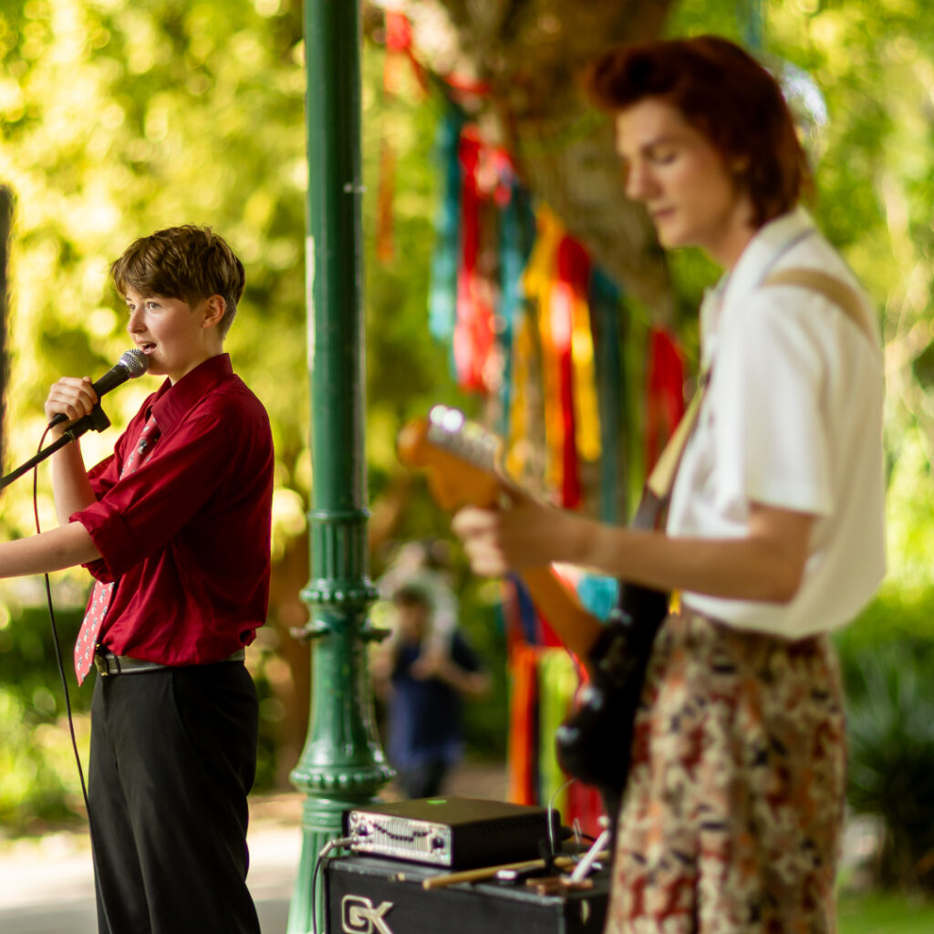 Two young people performing at Ventnor Bandstand