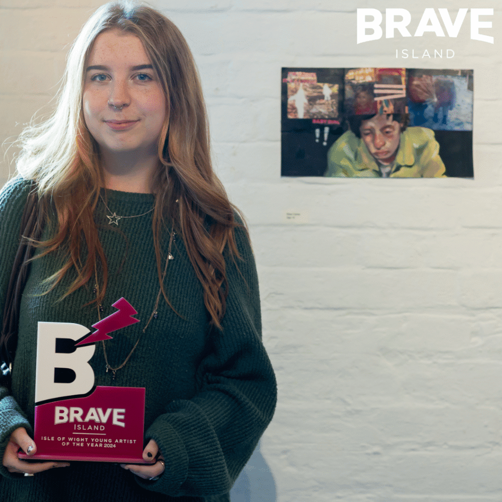 the winner of the young artist award 2024 posing with their artwork and award