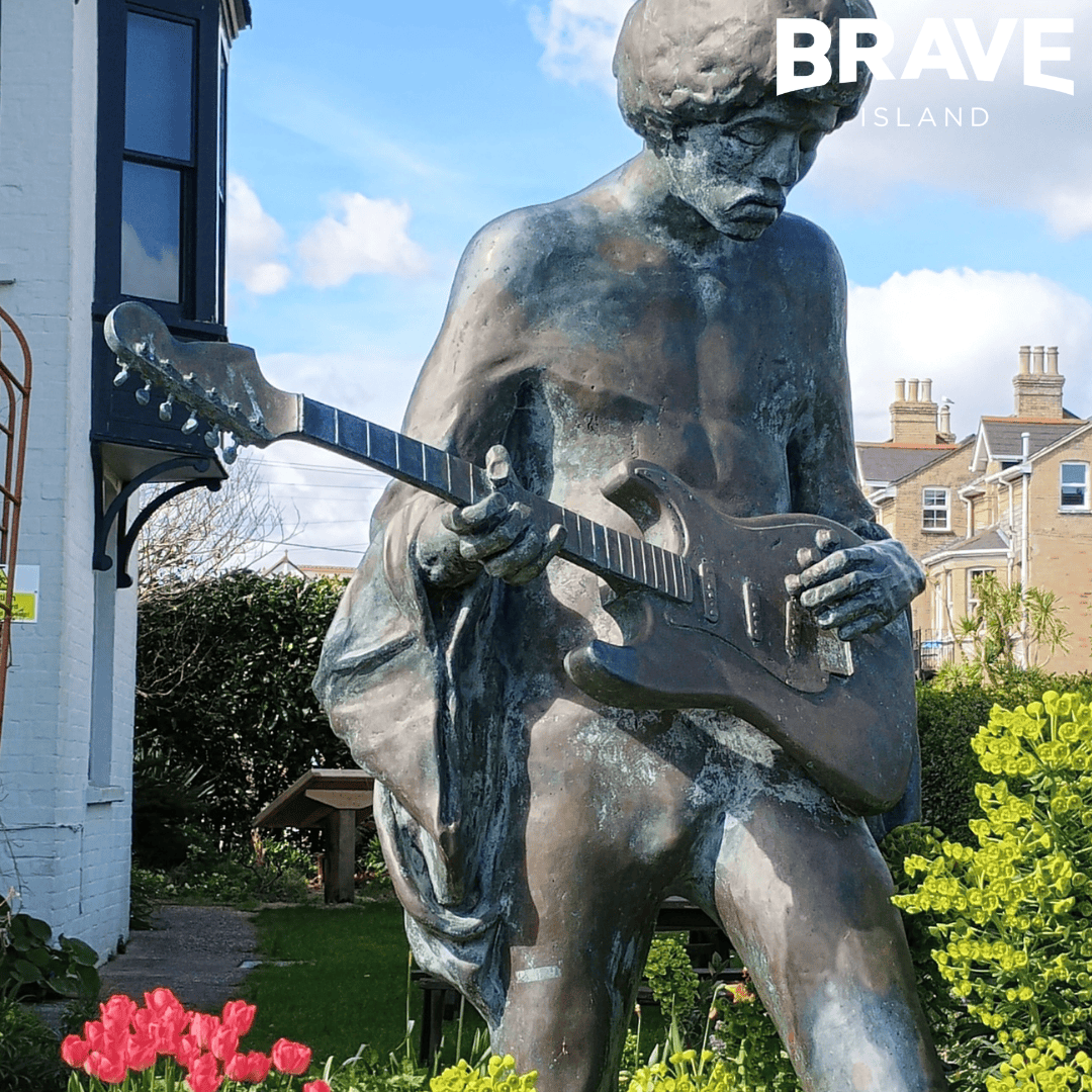 A sculpture of Jimi Hendrix outside Dimbola Museum & Galleries